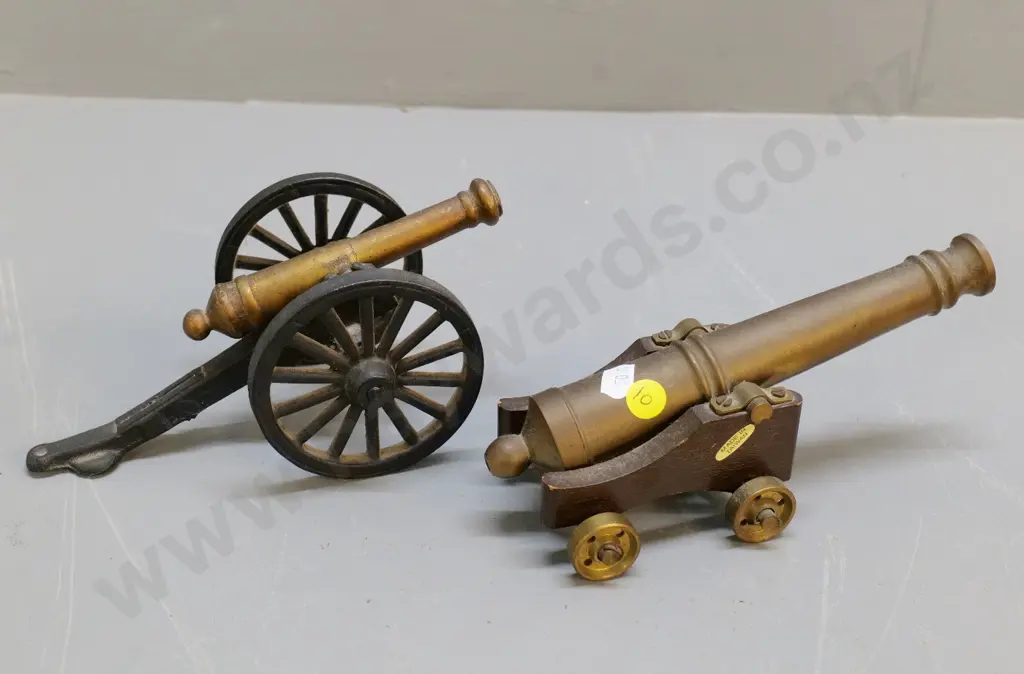 2 model cannons - brass & timber, Made in Taiwan label, and larger cast iron & brass H-90 L-190 W-110 Image 1++