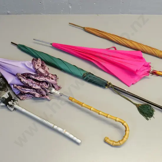 5 vintage or costume parasols & umbrellas with various fancy handles, tassels & frills - some damage and wear
