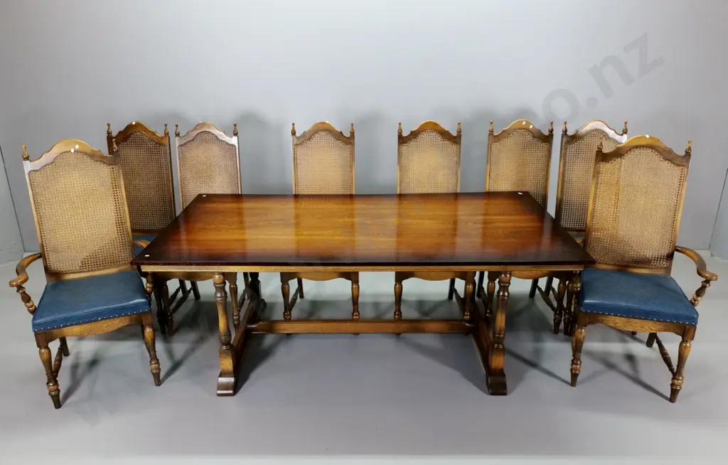 large oak dining table on Shaker style refectory base, 8 bergere cane high-back chairs incl. 2 carvers H720 L1980 W1050 Image 1++