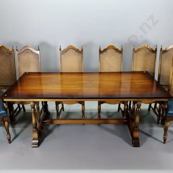 large oak dining table on Shaker style refectory base, 8 bergere cane high-back chairs incl. 2 carvers H720 L1980 W1050