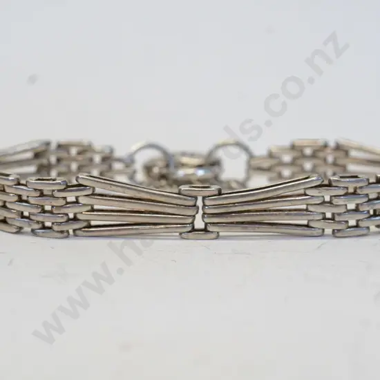 silver link bracelet with heart clasp
