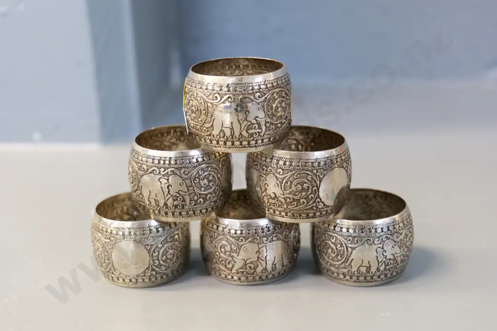 set of 6 Indian silver (plated?) elephant motif napkin rings Image 1++