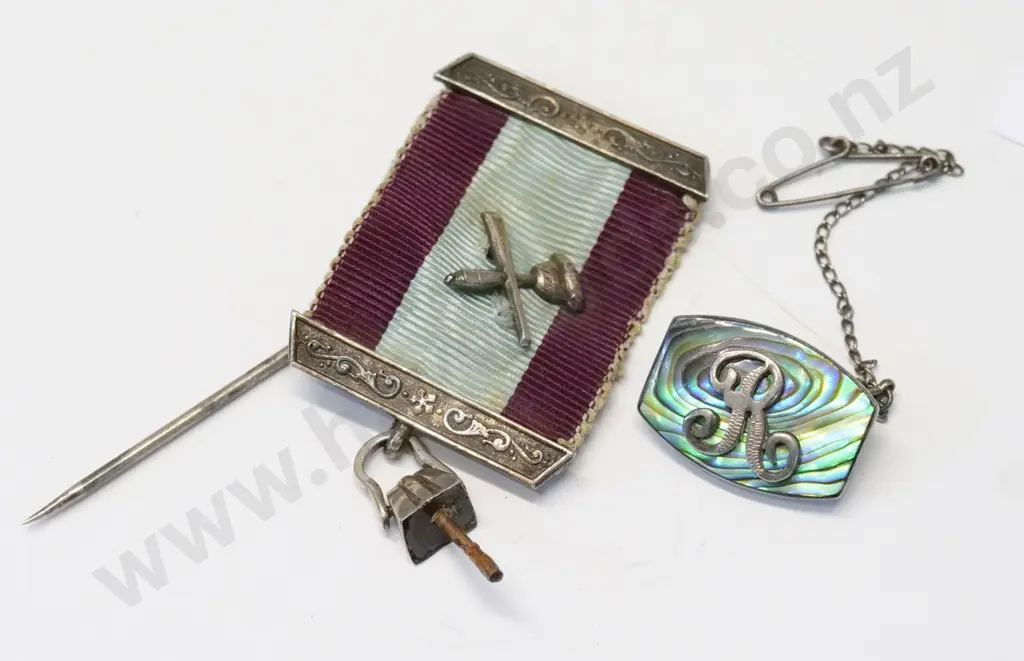 silver paua shell brooch with the letter R & a masonic medal Image 1++