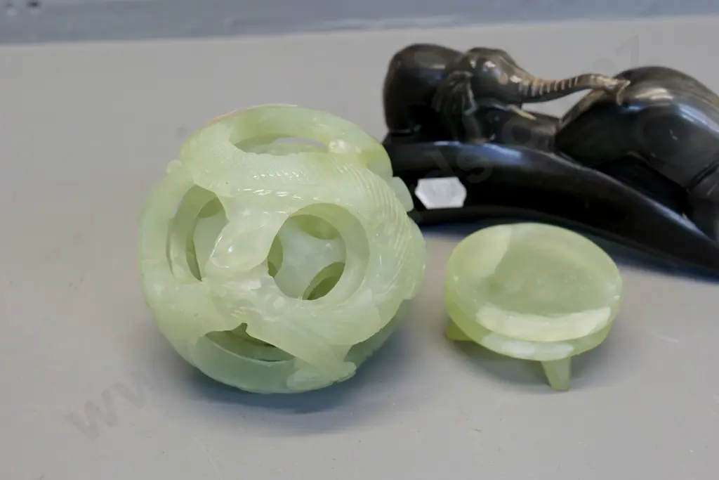 light green stone carved mystery ball D-100 on matching stone stand & a carved horn elephant pair L-200 Image 1++