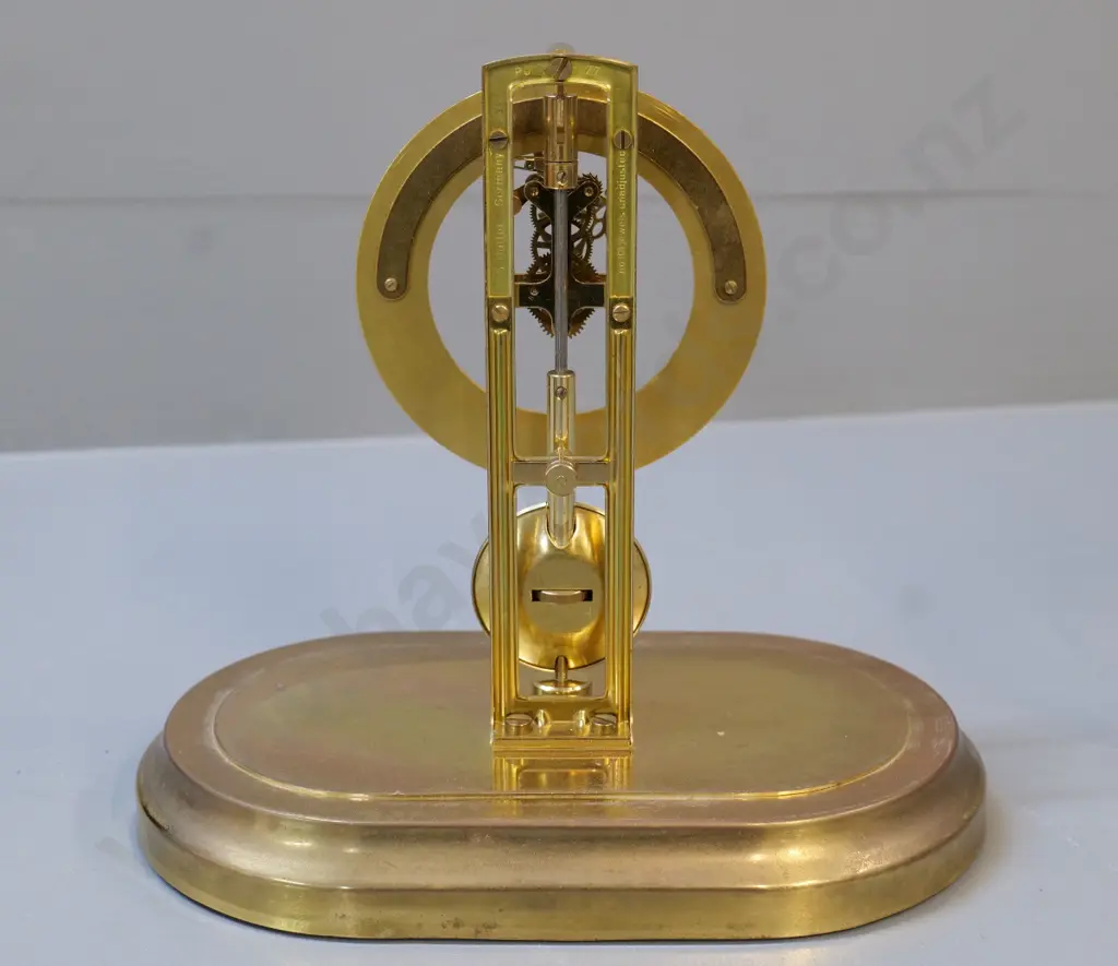 Reproduction battery powered skeleton clock with oval glass dome H-220 W-220 Image 1++