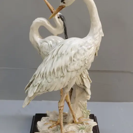 composite heron or egret pair figurine - on wooden base, plaque & stamped w/ G. Armani H-400