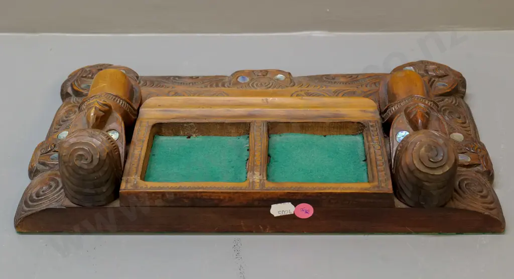 ornately carved Maori-motif desk organiser with paua insets - one missing - minor cracking W-360 D-220 Image 1++