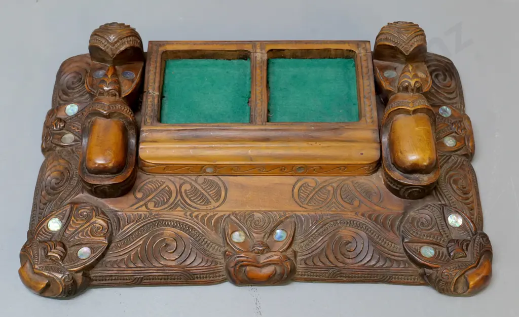 ornately carved Maori-motif desk organiser with paua insets - one missing - minor cracking W-360 D-220 Image 1++