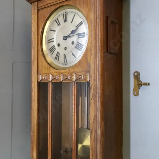 oak-cased German chiming wall clock - some damage to carved ornament H-775 W-340 D-180