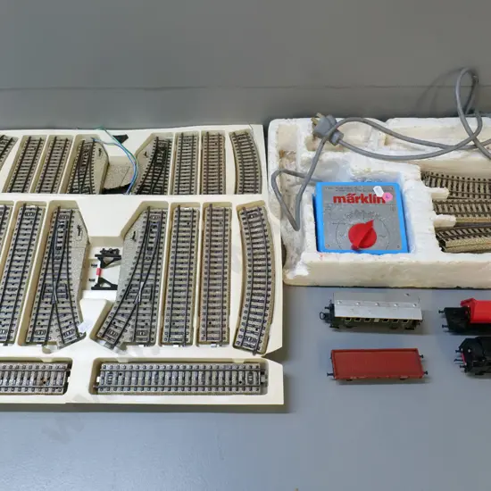 small electric train set with pressed metal rail sections, locomotive L-120 and 3 carriages, Marklin transformer