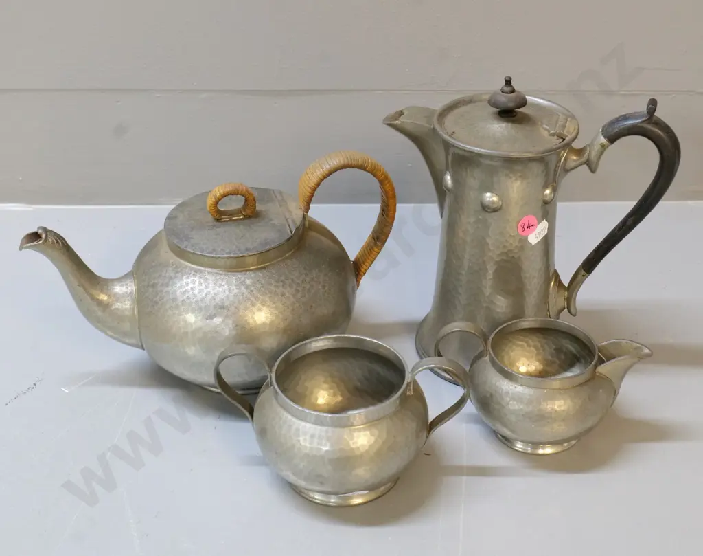 4 pieces of Don hand-beaten English pewter - 3 piece tea set with cane handle & a coffee pot with bakelite handle H210 Image 1++