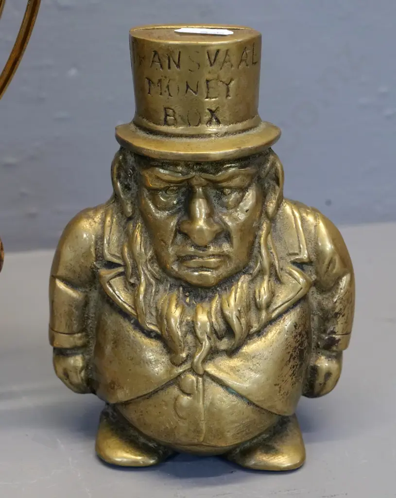 brass 2-part Kruger figural "Transvaal money box" and a souvenir Burns Cottage gong and stand with wooden beater H320 Image 1++