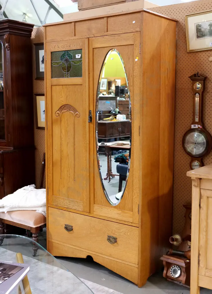 deco oak wardrobe w/bevelled oval mirror, leadlight pane, 2 door, 1 drawer, carved panel H1880 W930 D470 Image 1++