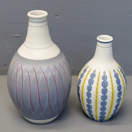 2 Poole hand-decorated pottery vases, larger H250, stamped 690, smaller stamped 689 & unreadable letters