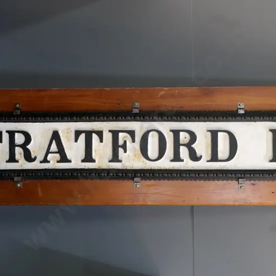 large and very heavy cast iron Stratford Road street sign on backing board - some surface corrosion. Board H350 W1500