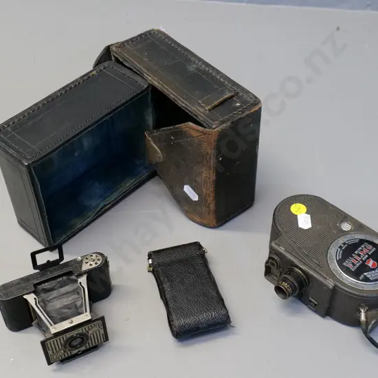 Bell & Howell Filmo 8mm cine camera & a small Ensign Midget Model 22 camera, bellows need repair - both w/leather cases
