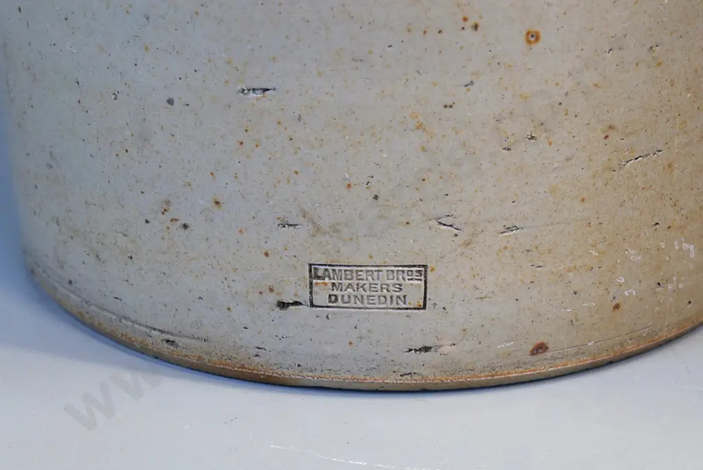 large wide mouth crock stamped "Lambert Bros Makers Dunedin" - chip to rim, has 2 holes bored in base H370 D290 Image 1++