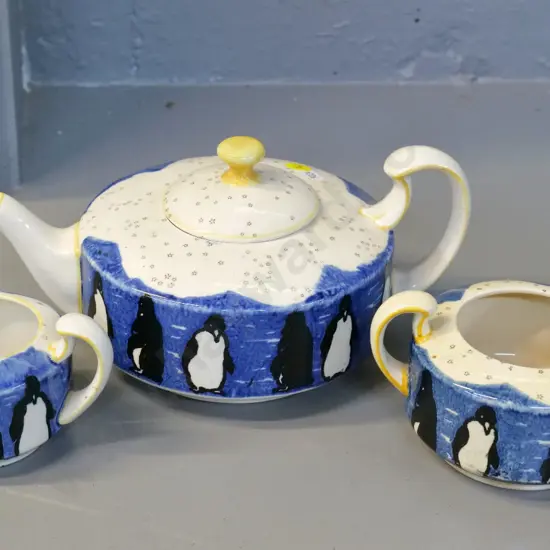 Royal Doulton 'Penguins' teapot, cream & sugar - glaze crack inside teapot, some staining inside sugar basin
