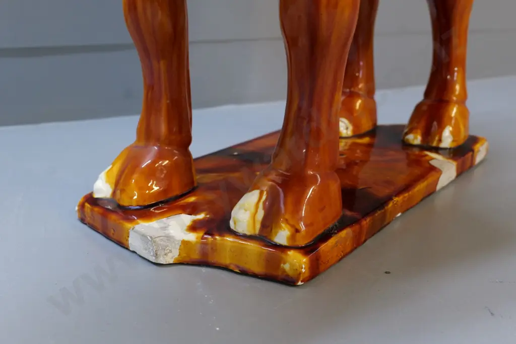 large ceramic camel with brown, cream and green trickle glaze - glaze chips all around base. H700 L600 Image 1++