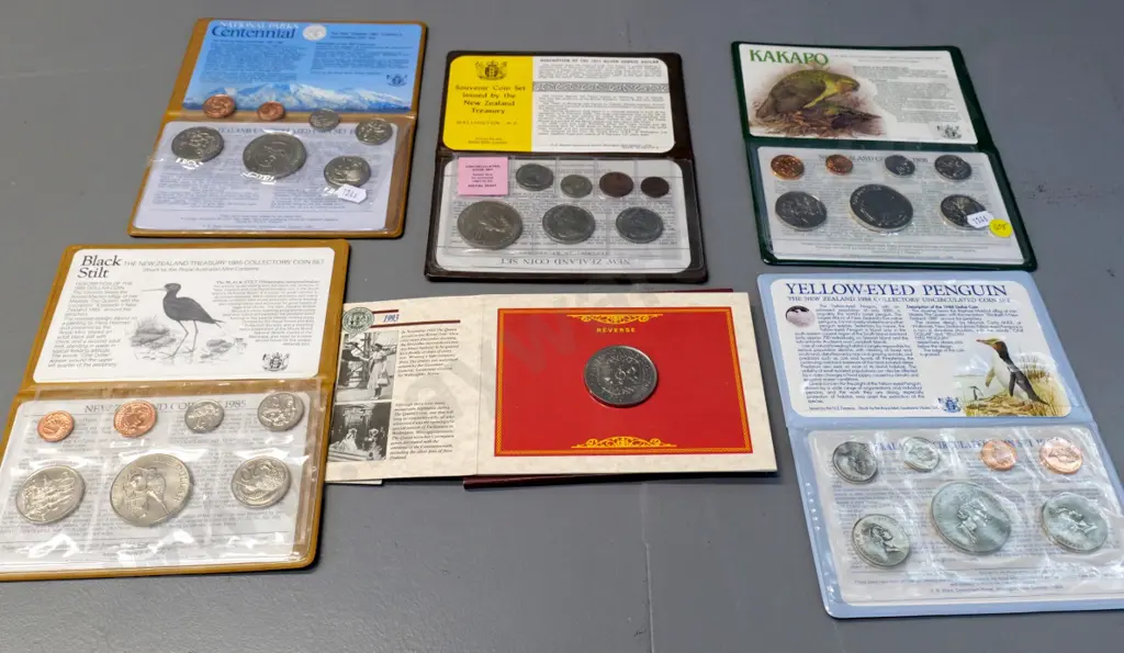 6 New Zealand coin collector sets - 1985, 86, 88 bird sets, 87 National Parks, Queen's silver jubilee, 93 coronation ann Image 1++