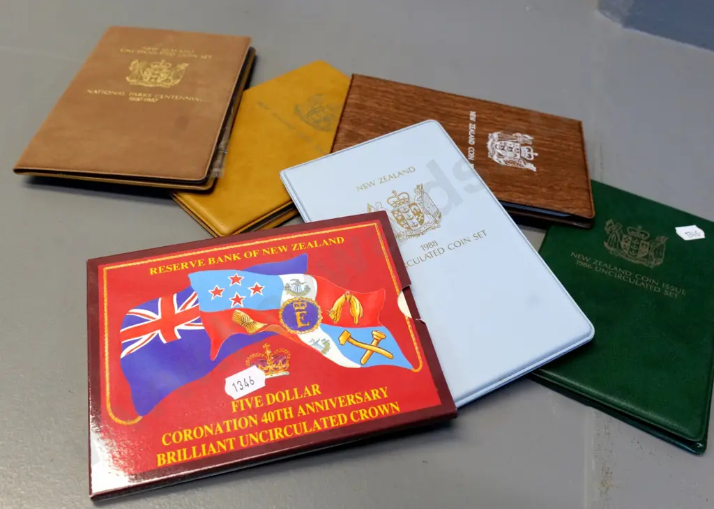 6 New Zealand coin collector sets - 1985, 86, 88 bird sets, 87 National Parks, Queen's silver jubilee, 93 coronation ann Image 1++