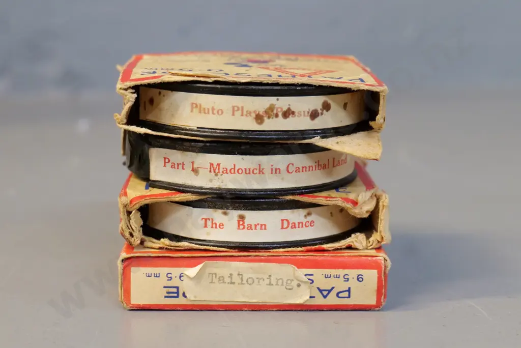 4 Pathescope 9.5mm film reels, including 1 Mickey Mouse, 2 8mm home movies and one small 16mm reel Image 1++