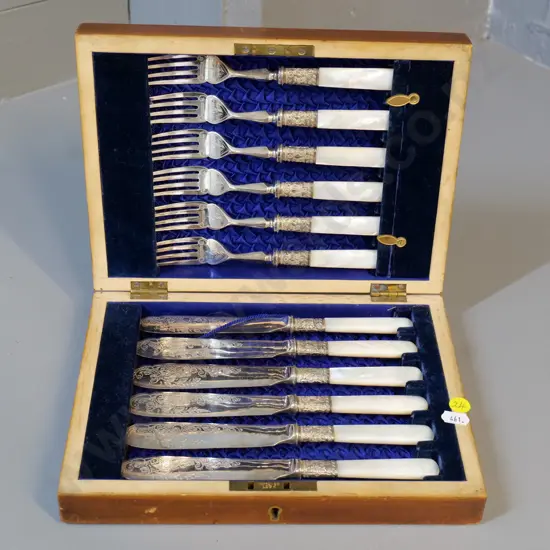 wood-cased set of EPNS & Mother of pearl fish forks and knives