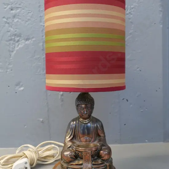 cast brass Buddha table lamp with copper finish, wooden base, striped shade H-390 D-160