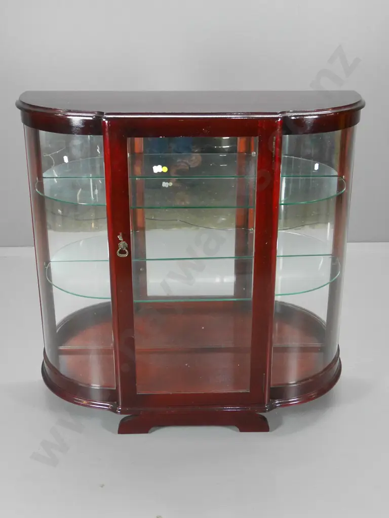 reproduction mahogany bow-front china cabinet; adjustable glass shelves, escutcheon & key, mirror back H1010 W1020 D370 Image 1++