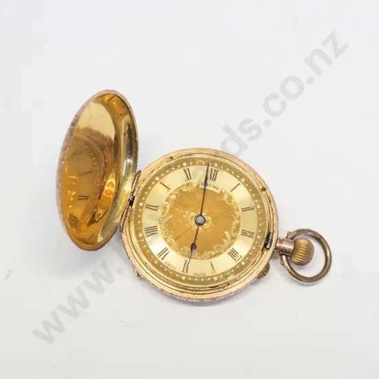 small gold pocket watch stamped 9C  B&C