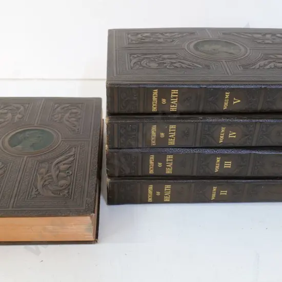 5 volumes from larger set of 8 Encyclopedia of Health - McFadden 1933, some pieces separated from anatomy die cuts
