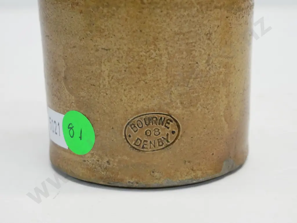 Dumpy ginger beer bottle, Saunders and Co, Christchurch, maker Bourne Denby 03, condition poor, H -170 Image 1++
