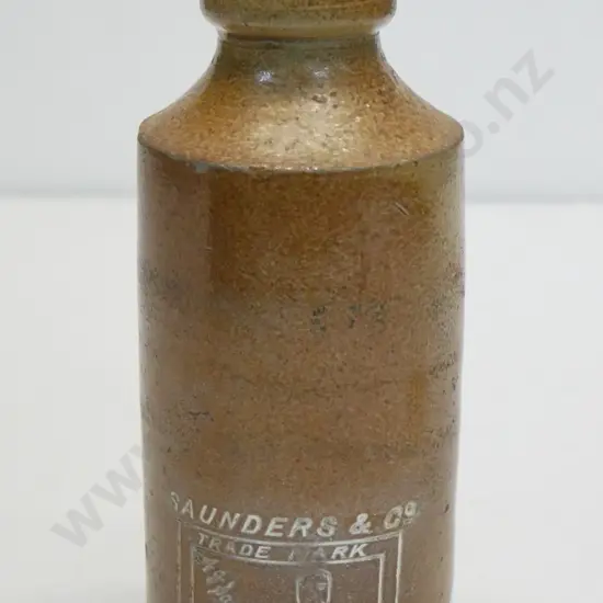 Dumpy ginger beer bottle, Saunders and Co, Christchurch, maker Bourne Denby 03, condition poor, H -170