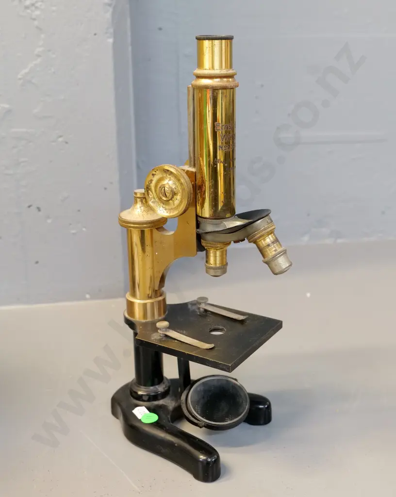 brass microscope marked Ernst Leitz Wetzlar and Otago University Anatomy with 2 lenses & objective; some surface pitting Image 1++