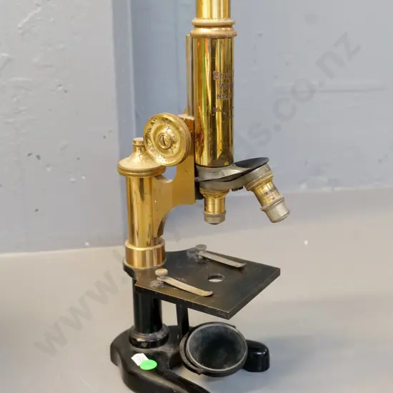 brass microscope marked Ernst Leitz Wetzlar and Otago University Anatomy with 2 lenses & objective; some surface pitting