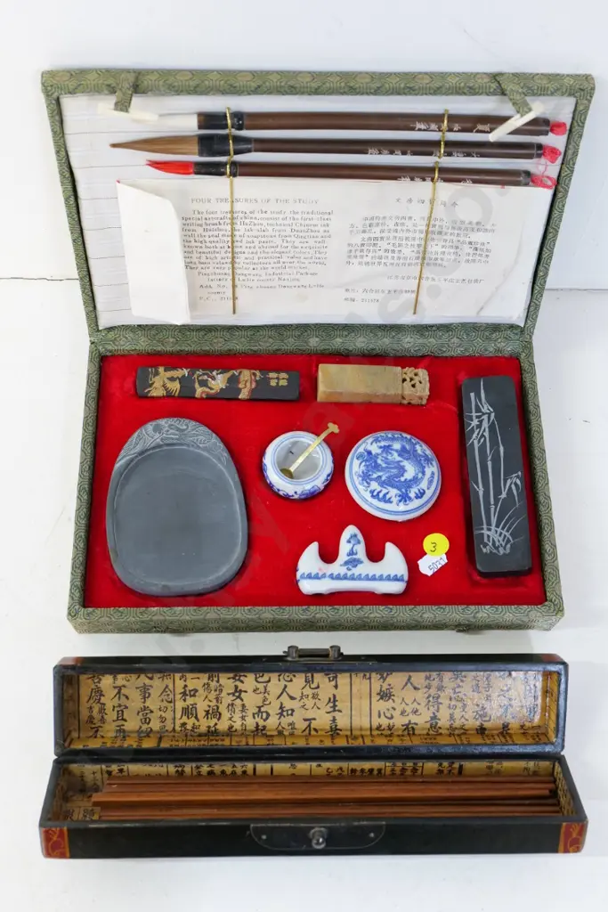 boxed calligraphy set W280 D180 and a reproduction painted wooden box containing some wood chopsticks Image 1++