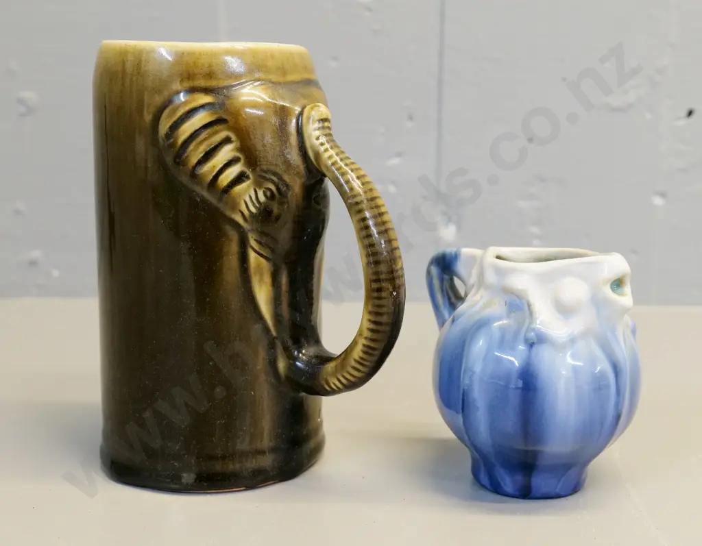 studio pottery jug with elephant handle H-170 and a small fish jug - no maker's marks on either Image 1++