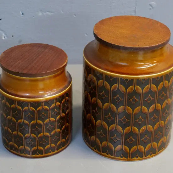 2 retro Hornsea 'Heirloom' pattern storage jars with timber lids - larger is H-200 D-150