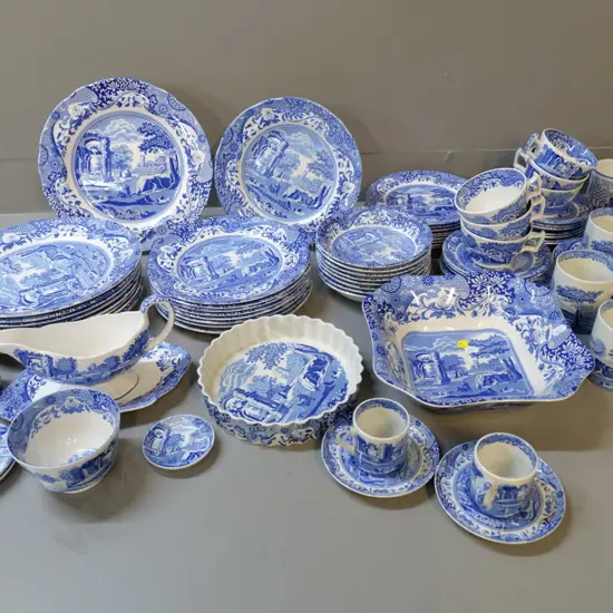 large collection of Spode Italian pattern dinnerware plus a few Geranium pattern mugs.