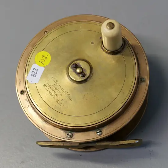 vintage brass fishing reel with bakelite knob - marked J Bernard & Son England D-120