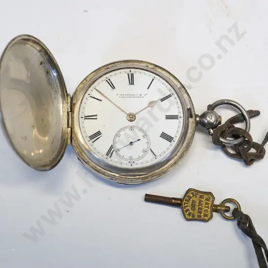 silver pocket watch with key stamped shield, lion, H