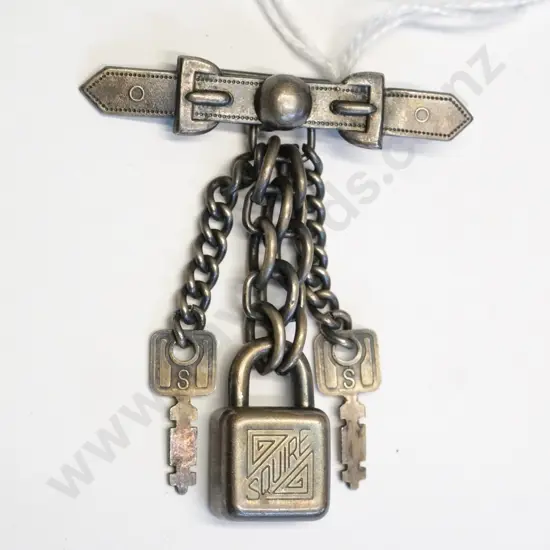 small bar brooch - belt shaped with tiny padlock and keys on chains. Lock marked Hy Squire & Sons