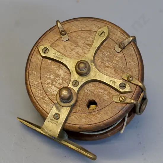vintage wood & brass fishing reel marked Wilkies Dunedin D-100