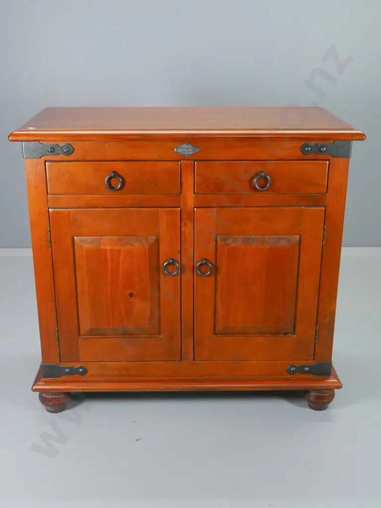 dark stained rimu nordic style sideboard with iron corner brackets and ring handles, ball feet H960 W1030 D520 Image 1++