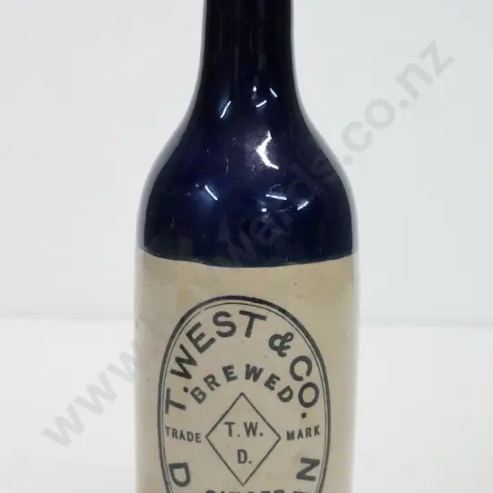 Ginger beer, crown cap, T West and Co, Dunedin, condition poor, has been filled at back, H - 210