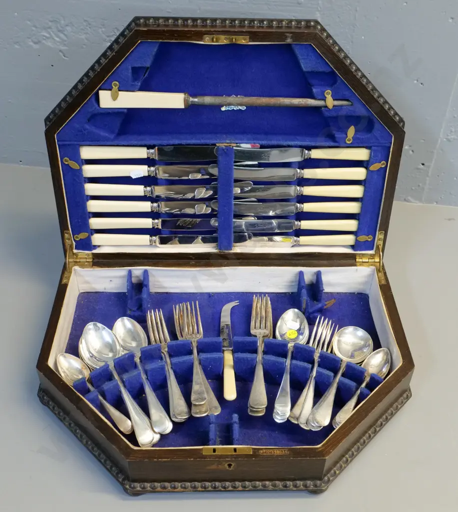 oak-cased canteen of Leinster EPNS cutlery: 6 place & 12 bone handled knives, missing serving spoons, carving knife&fork Image 1++
