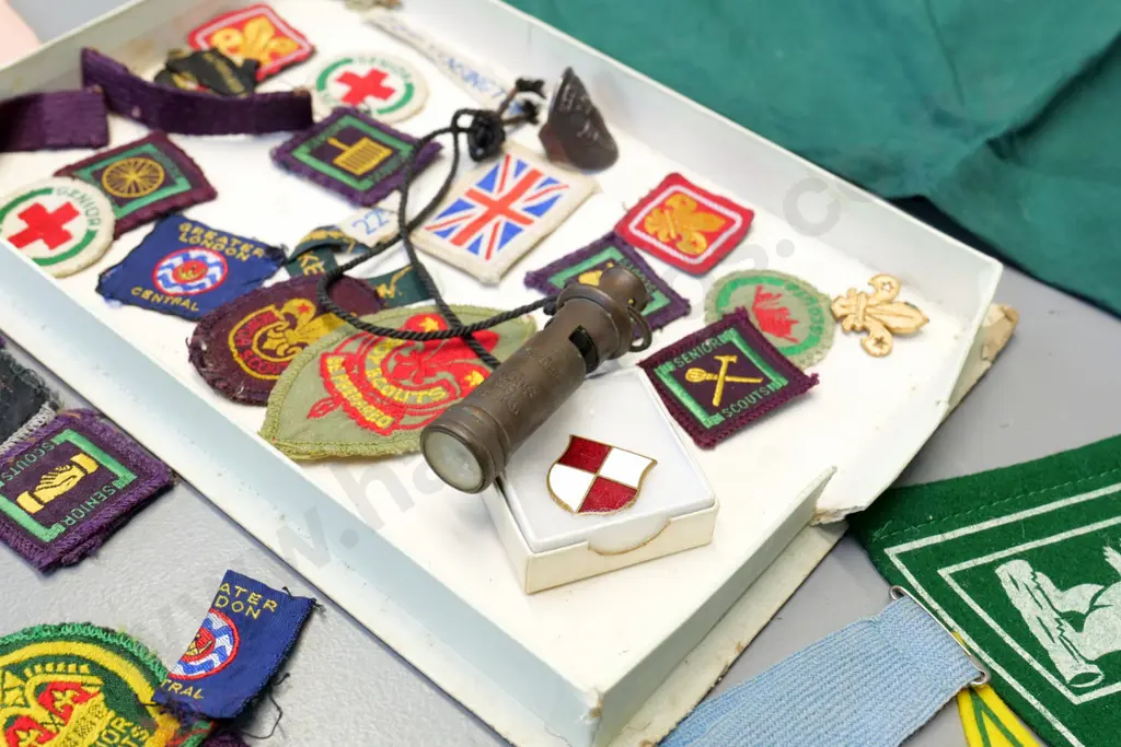assorted 1960s era English boy scout badges and ephemera, including Acme Boy Scout whistle with built in compass Image 1++