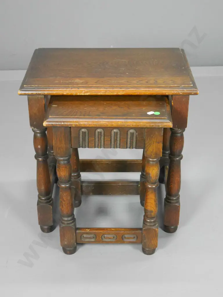 2 oak Tudor style nesting tables - polish needs some work. Larger is H-460 W-440 D-320 Image 1++