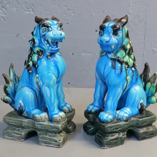 pair of teal, green and brown china foo dog figures H-270