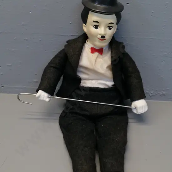 soft-bodied Charlie Chaplin doll with plaster feet, hands and head H-510